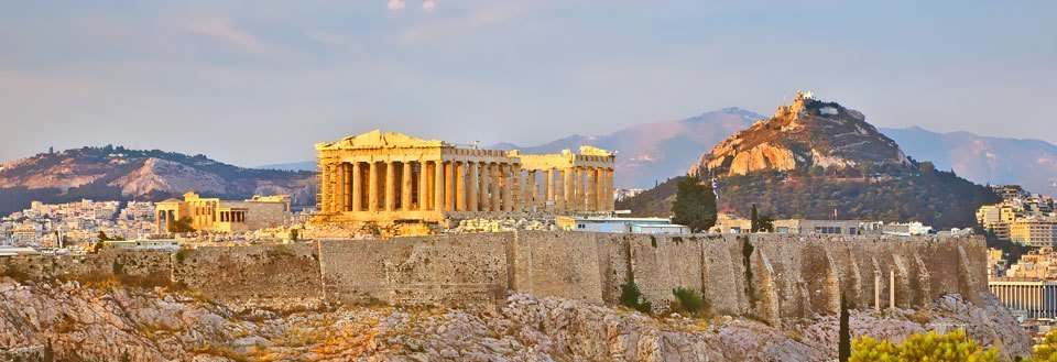 Akropolis i Athen, Hellas, med Parthenon-tempelet mot en bakgrunn av solnedgang.